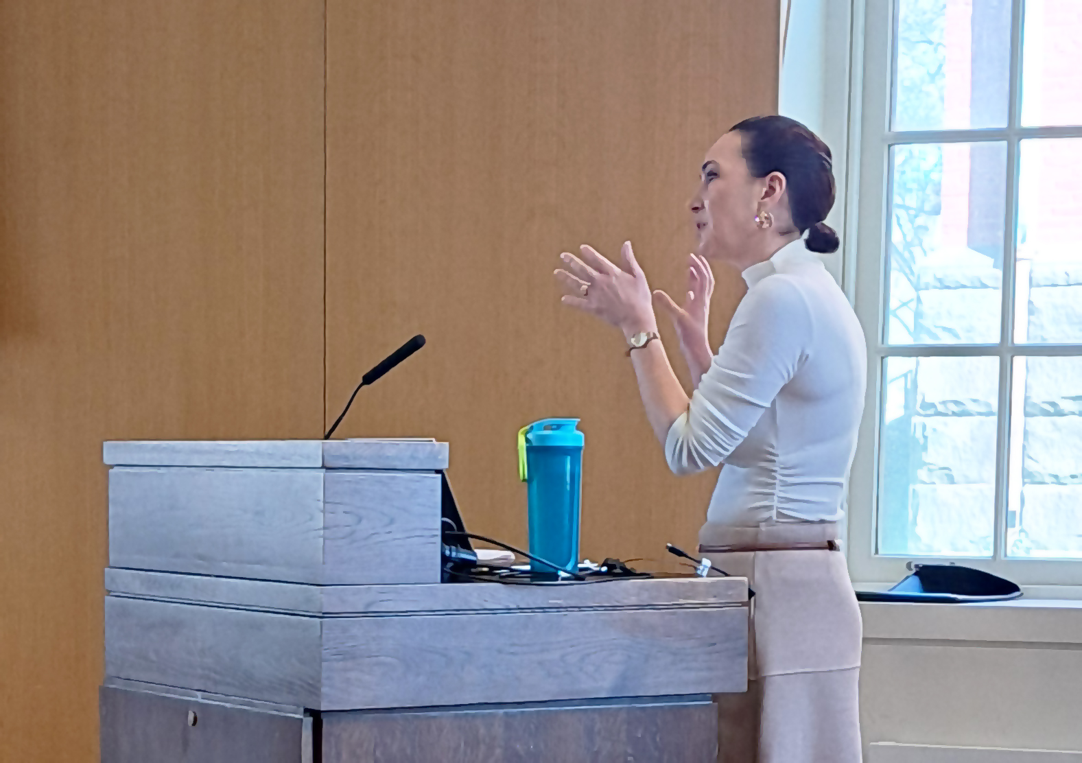 Sarah Bell at classroom podium
