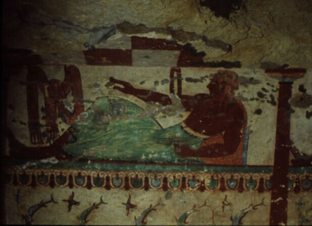 Figure 7 - 'reclining banqueter', detail of the right wall of the Tomba delle Leonesse, Tarquinia, Brown University Archive