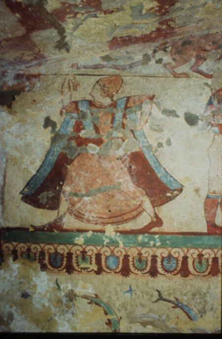 Figure 8 - 'woman wearing a tutulus', detail of the rear wall of the Tomba delle Leonesse, Tarquinia, Brown University Archive